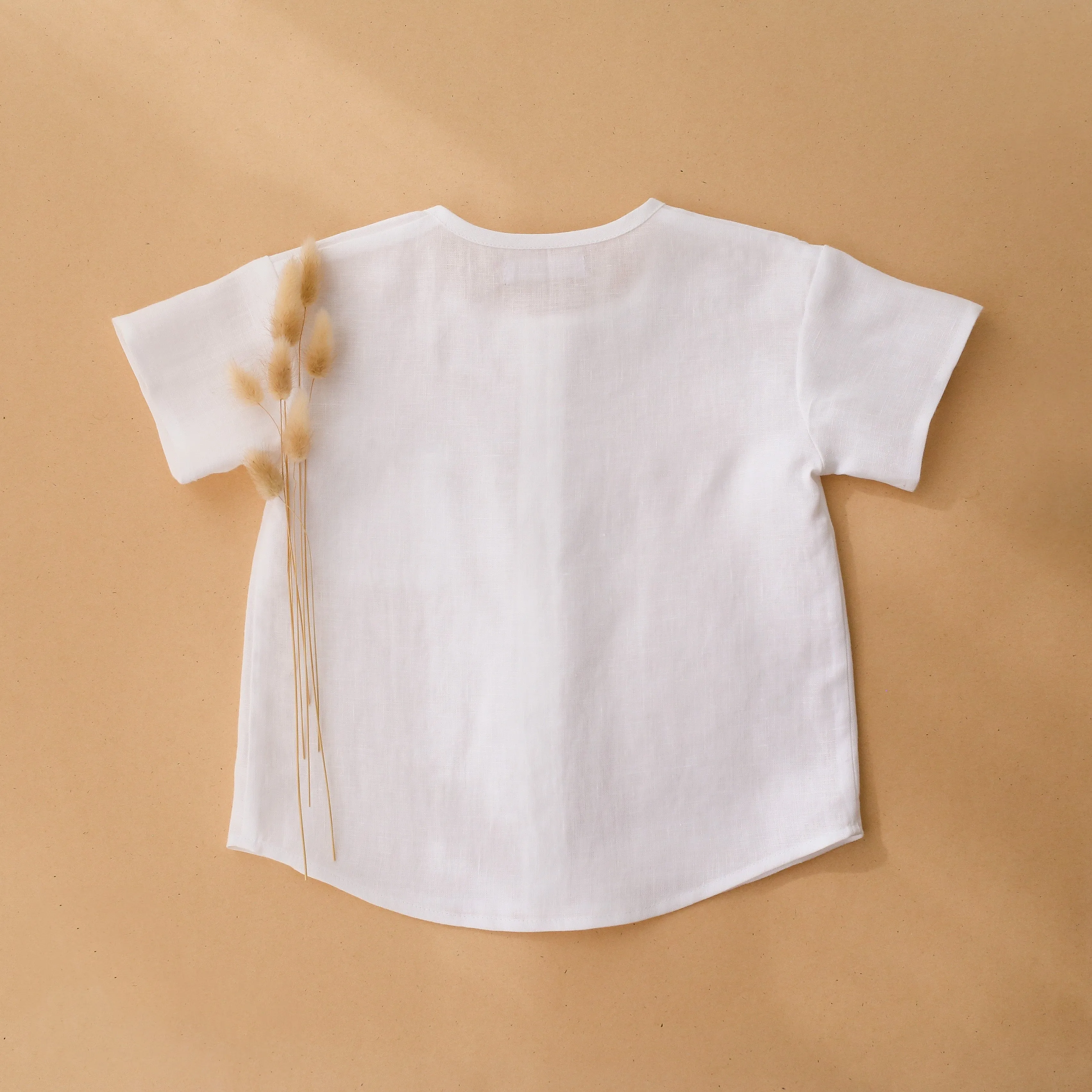 White Linen Short Sleeve Buttoned Top with Curved Hemline